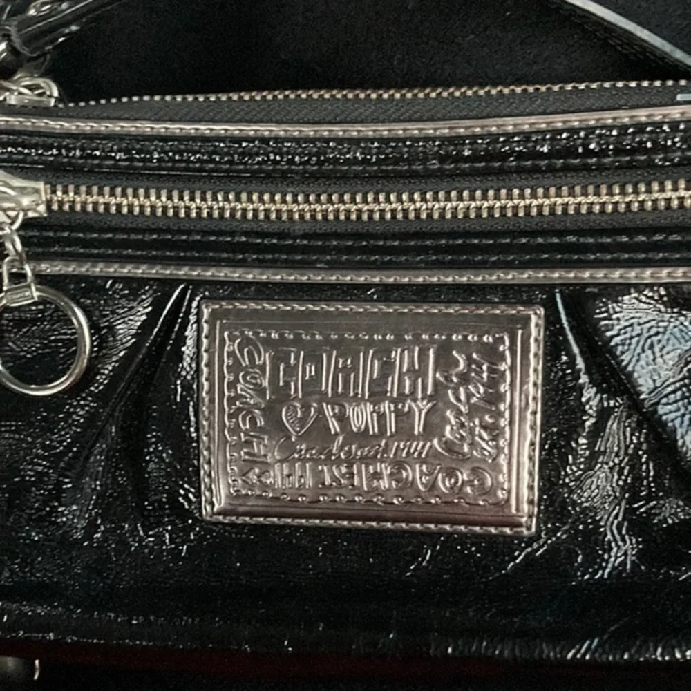 Coach black patent leather liquid gloss poppy mini bag